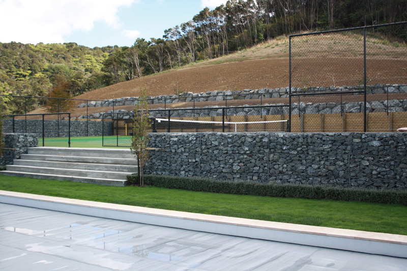 Tennis courts Gabion wall and stone retaining wall