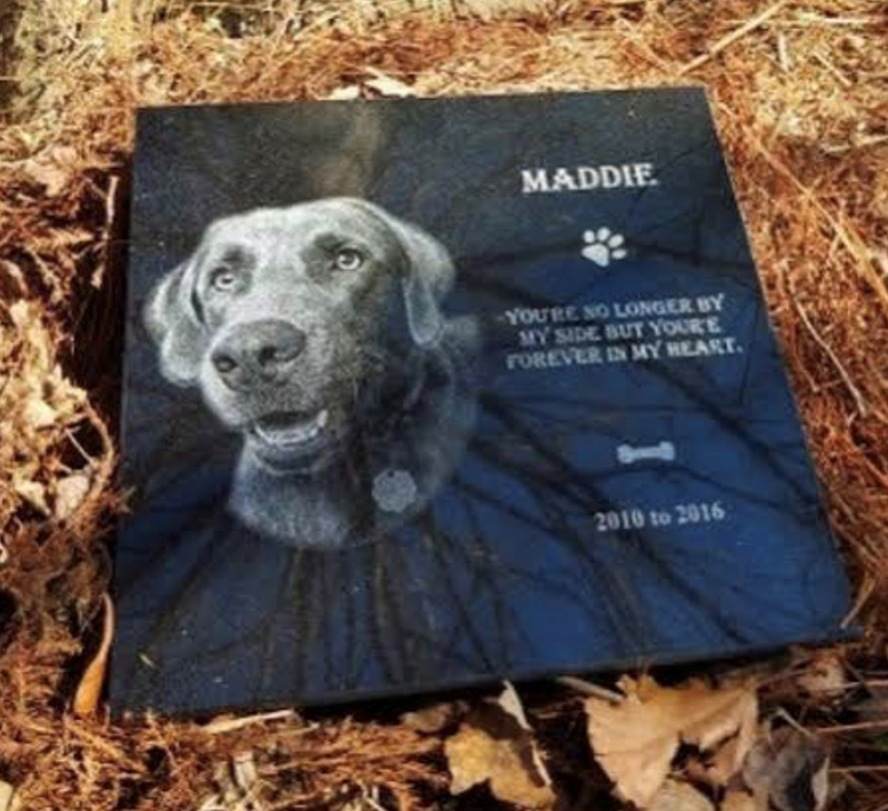 Stone engraved memorial plaque for a beloved pet
